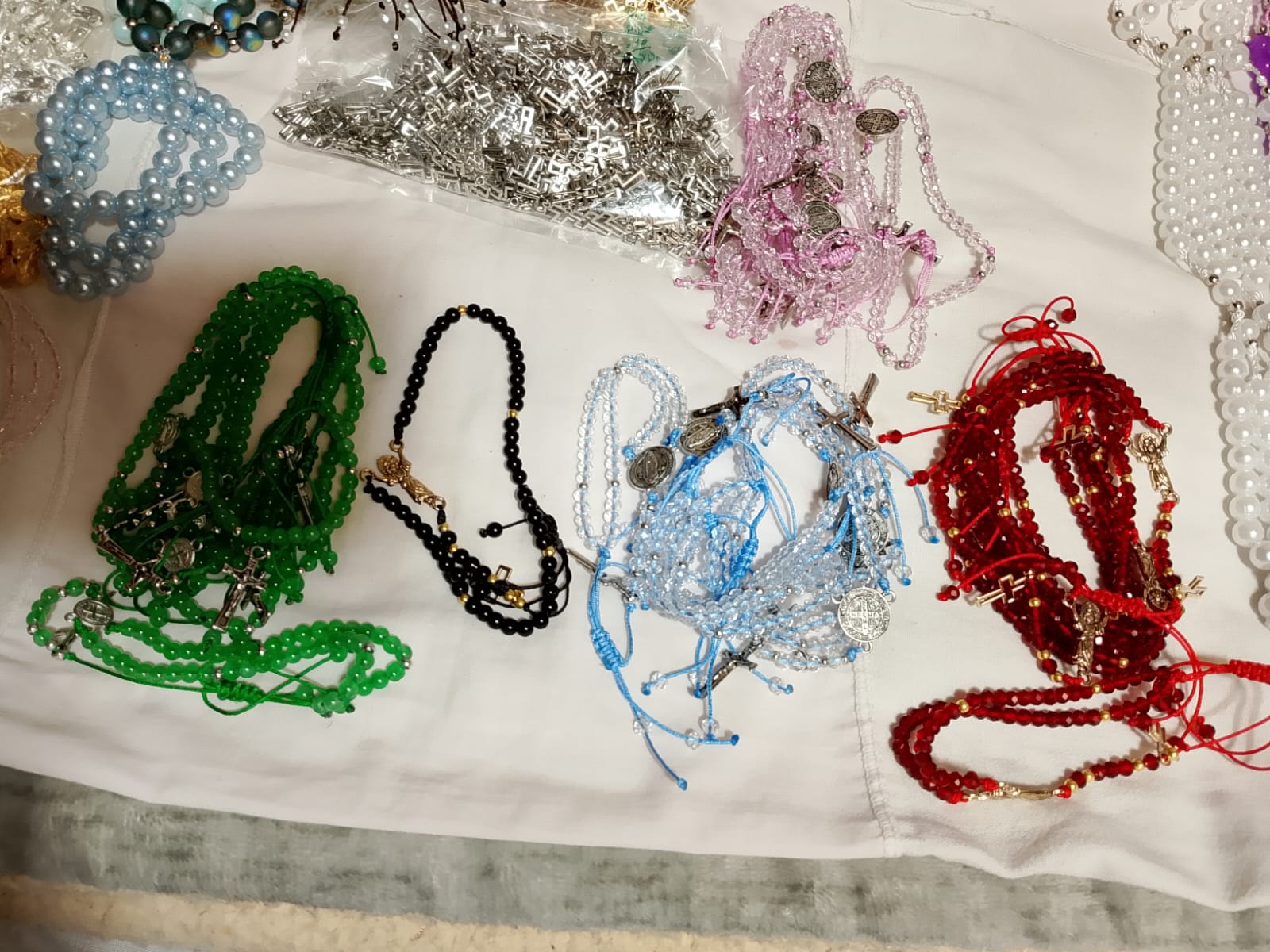 Green, black, clear with blue thread, red and clear with pink thread Rosary bracelet